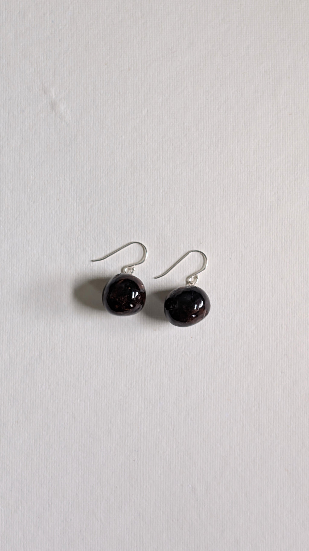 Hand painted ceramic orb earrings in chocolate brown with sterling silver ear wires.